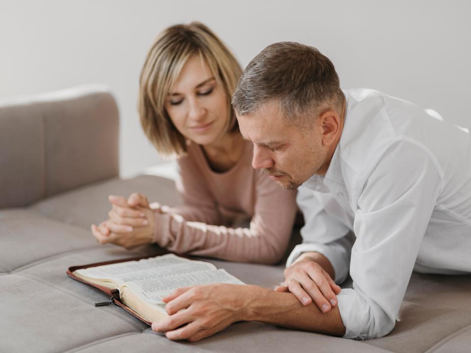 couple reading bible scriptures